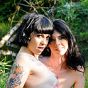 Hot Mandy and Sparky playing with each other outdoors