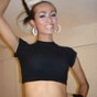 Tall and gorgeous ladyboy doing striptease